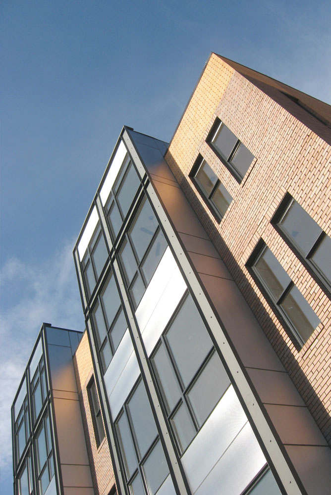 W Street Condo, brick and stainless facade